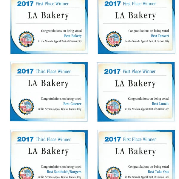 Six award certificates for LA Bakery, including "Best Bakery," "Best Dessert," and "Best Lunch."
