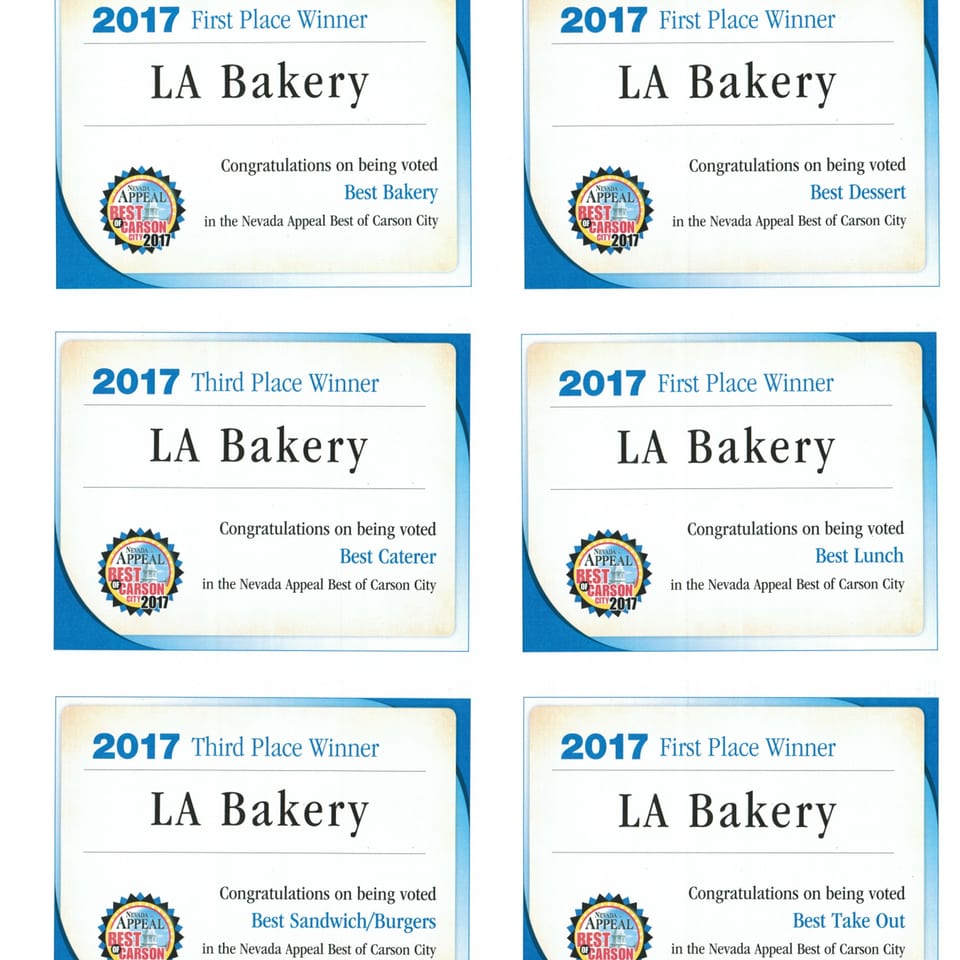 Six award certificates for LA Bakery, including "Best Bakery," "Best Dessert," and "Best Lunch."