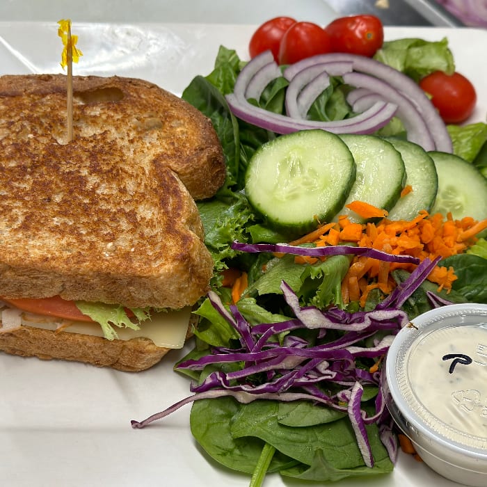 1/2 Sandwich & 1/2 Mixed Green Salad.